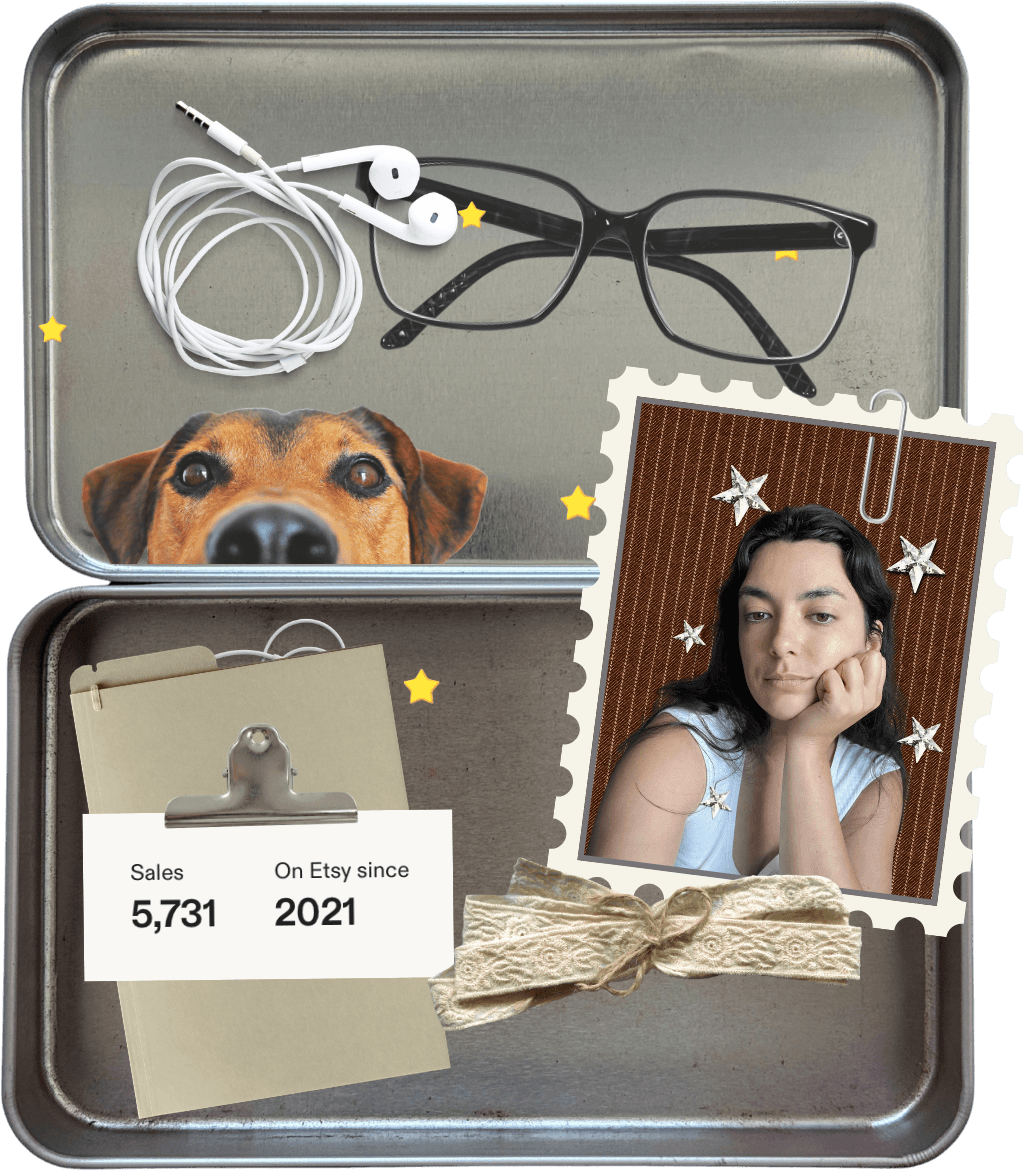 A tin tray holding earphones, glasses and a peeking dog, with Gabi's photo on a stamp, a clipboard note of sales and a lace bow