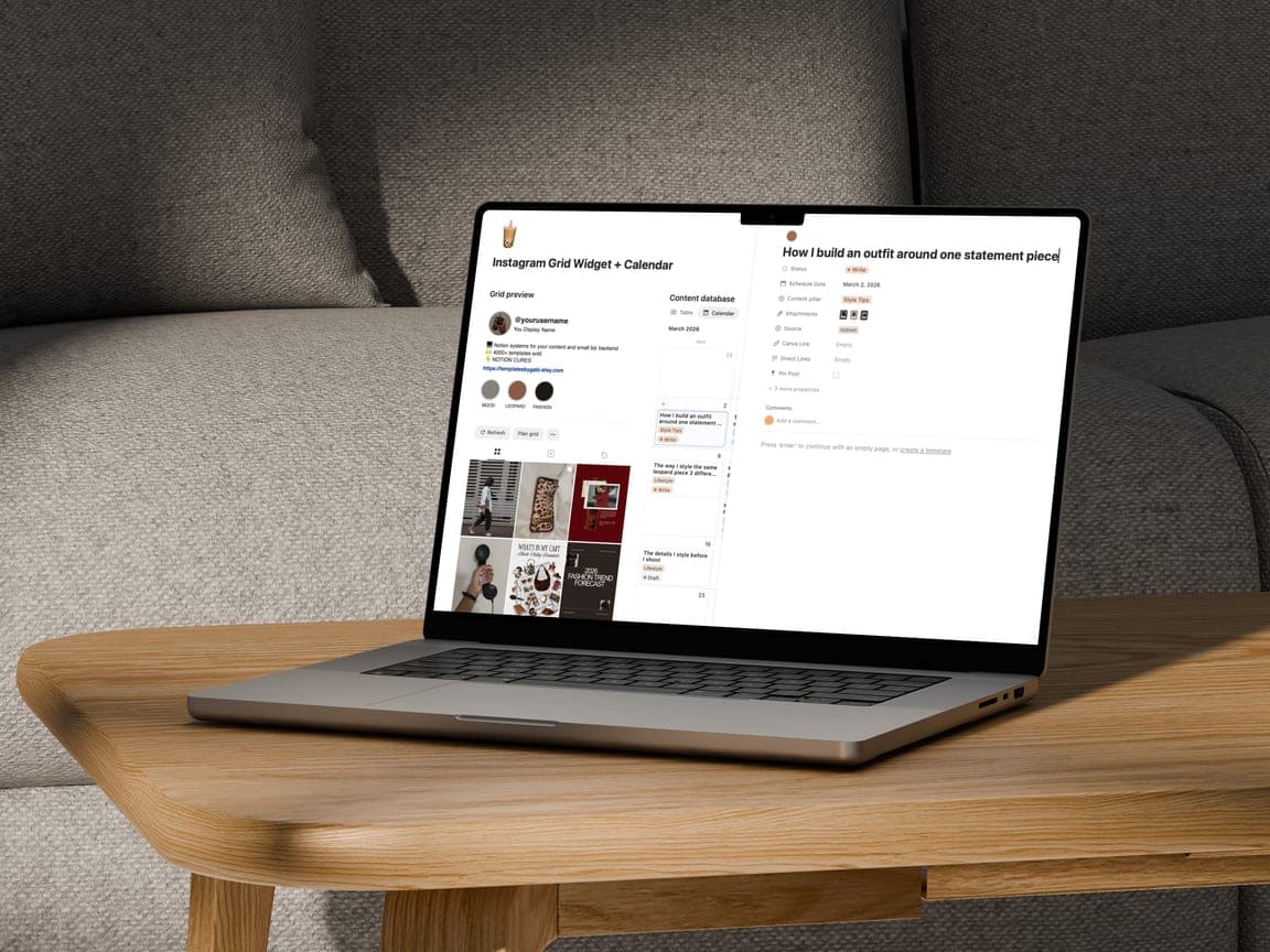 A laptop on a wooden table showing the Instagram grid widget beside a Notion content database